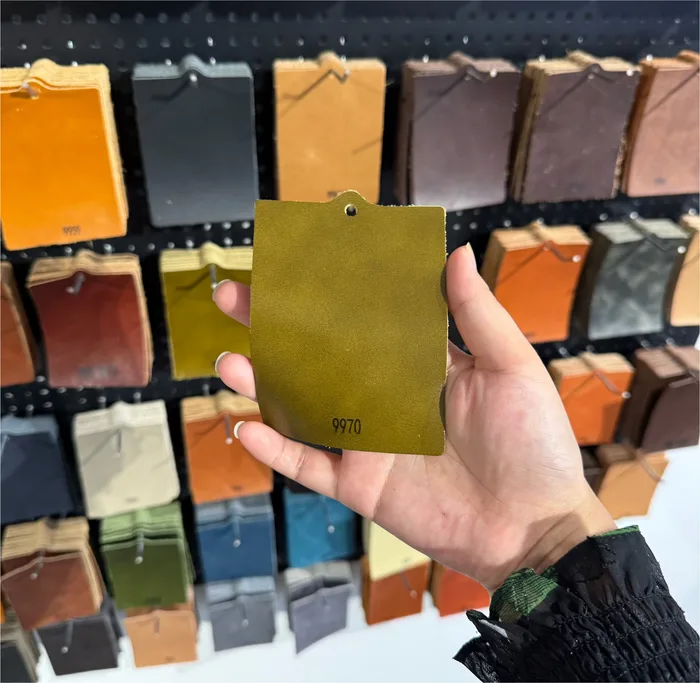 Leather sample approval — bespoke furniture production at J&G Maison